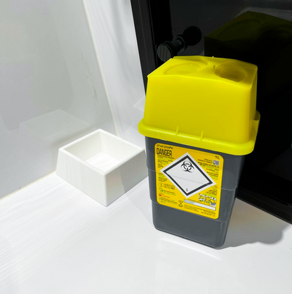Base de maintien pour boites à aiguille Sharpsafe
